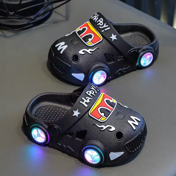 Zuecos infantiles Pielumi con faros LED, color negro
